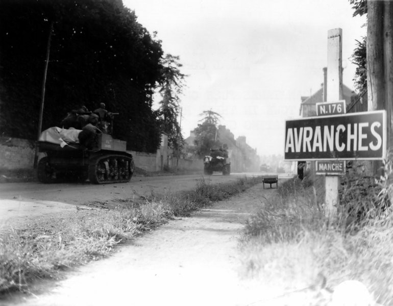 770px-American tanks move through Avranches